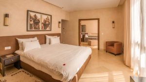 chambre lit double Al Maaden Villa Hotel & Spa